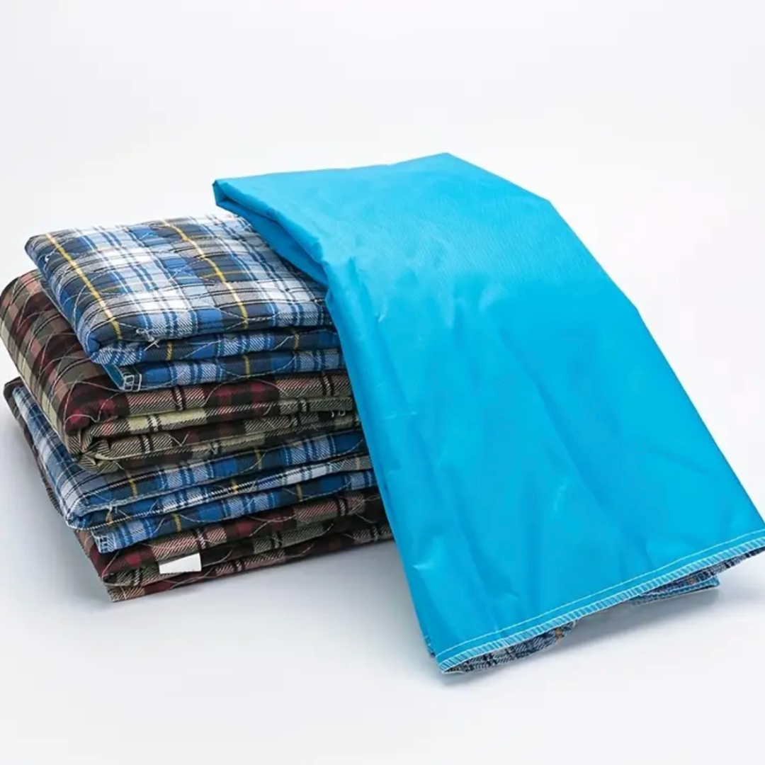 DryBed | Almohadilla de pañal impermeable y lavable para cama